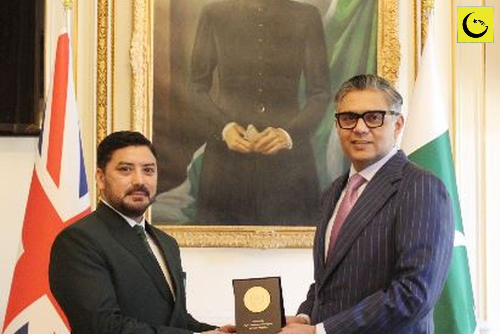 Pakistan Army Cambrian Patrol team member receiving a plaque after winning Silver in Wales