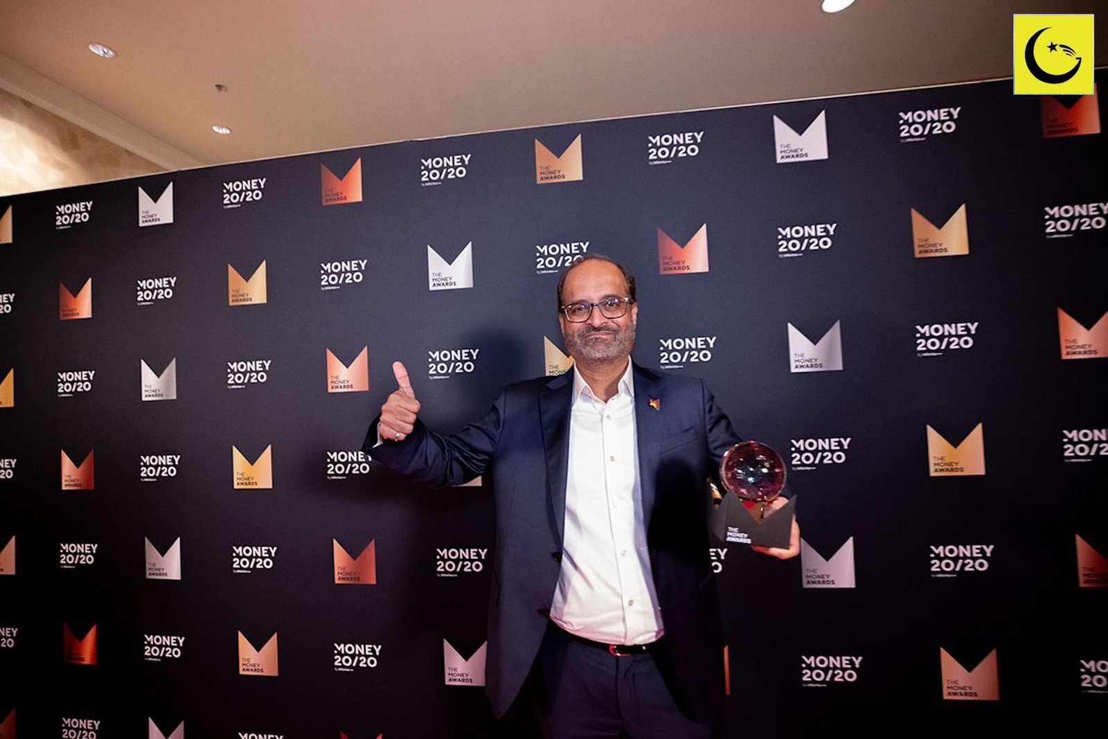 JazzCash Money20/20 Award 2026: Murtaza Ali, CEO of JazzCash, holding The Money Awards trophy in Las Vegas (Photo: Money20/20)