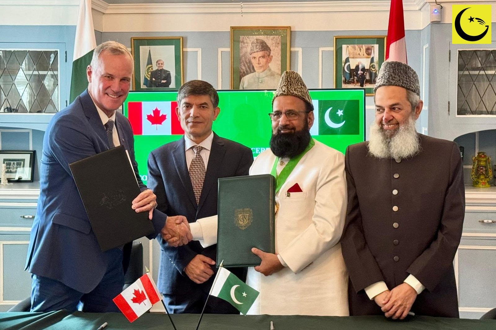 Pakistan Canada Medical Education MoU 2026 signing in Ottawa: CPSP and RCPSC leaders shake hands holding the signed folders in front of the Pakistan and Canada flags