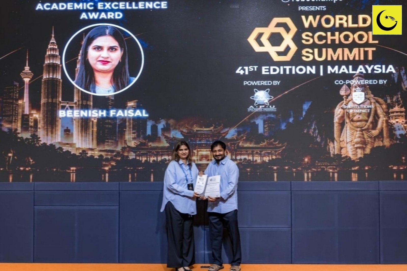 Beenish Faisal Academic Excellence Award: receiving the award on stage at the 41st World School Summit 2026 in Kuala Lumpur